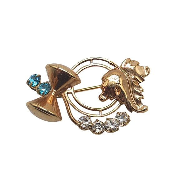 Vintage Gold Tone Brooch With Blue Clear Rhinestones Bow Leaf Design - Picture 1 of 4